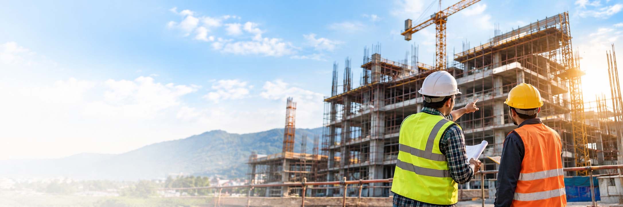 Engineers reviewing plans at a construction site
